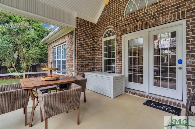 view of patio with outdoor dining space and french doors