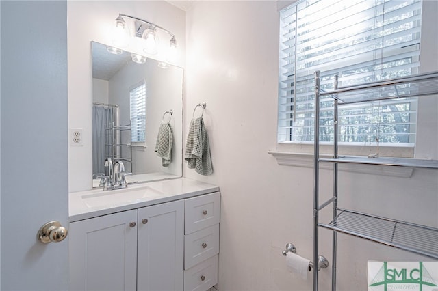 full bathroom featuring vanity