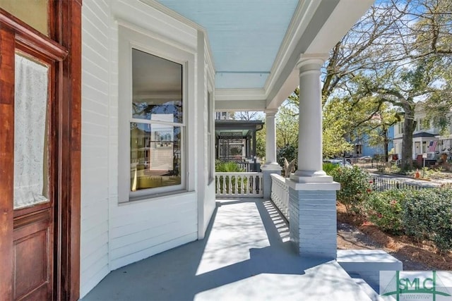 view of patio featuring a porch