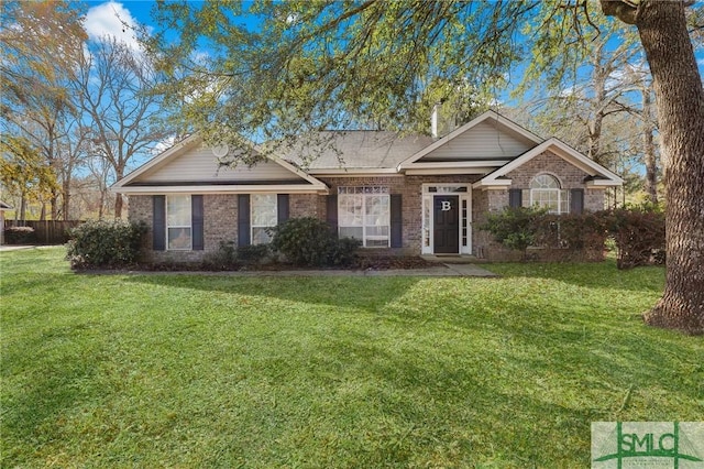 ranch-style house with brick siding and a front lawn