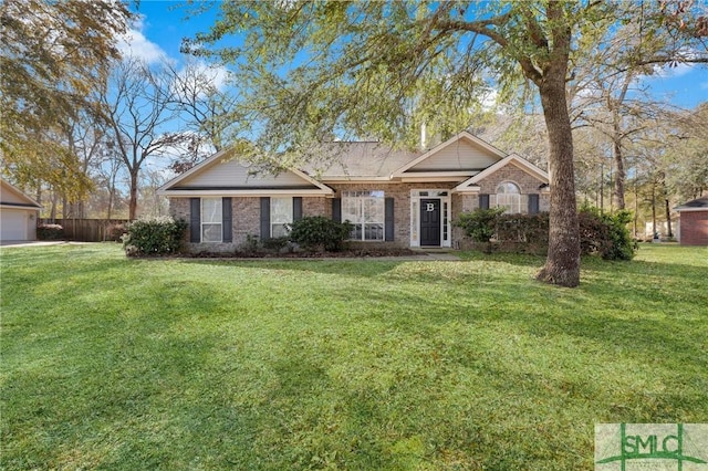 ranch-style house featuring brick siding and a front lawn