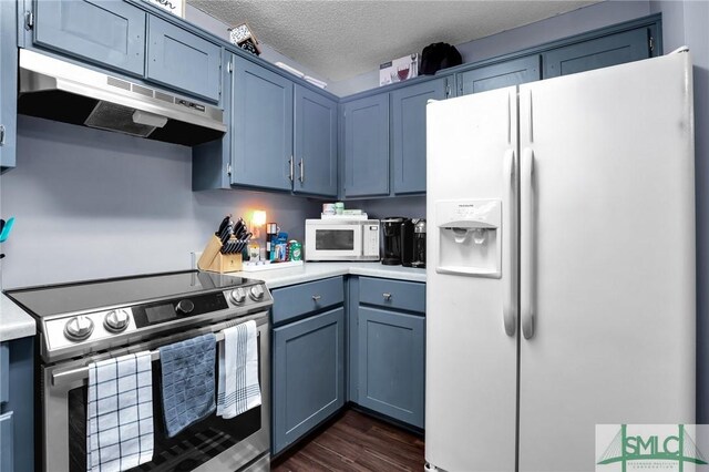 kitchen featuring blue cabinets, under cabinet range hood, a textured ceiling, white appliances, and light countertops