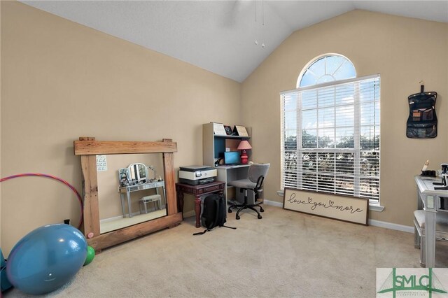 home office with baseboards, carpet, and lofted ceiling