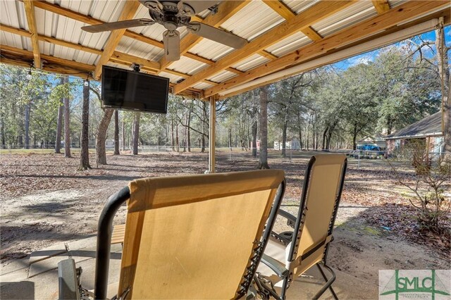 view of patio featuring a ceiling fan