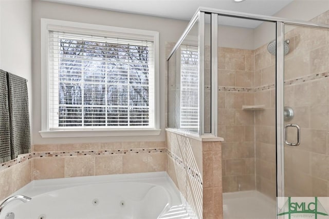 bathroom with a stall shower and a whirlpool tub