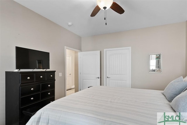 bedroom with a closet and a ceiling fan