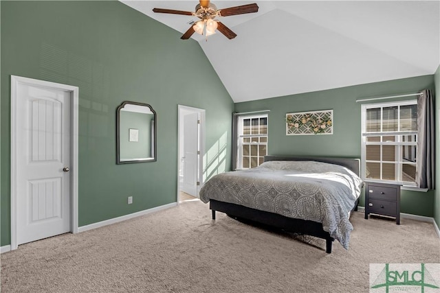 bedroom with baseboards, carpet floors, and high vaulted ceiling