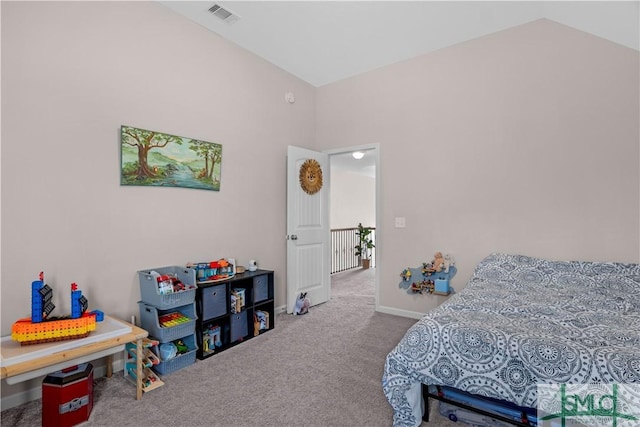 carpeted bedroom with visible vents and baseboards