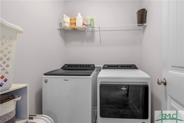 laundry room featuring laundry area and washing machine and dryer