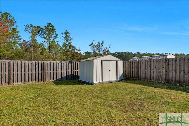 view of shed featuring a fenced backyard