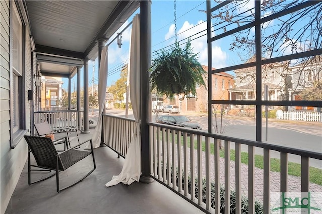 sunroom featuring a healthy amount of sunlight