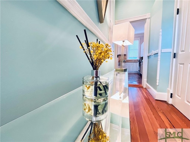 hallway with wood finished floors