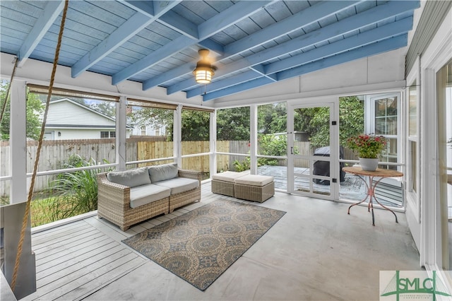 sunroom with lofted ceiling with beams and wood ceiling