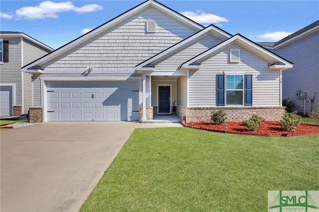 craftsman house featuring brick siding, an attached garage, concrete driveway, and a front yard