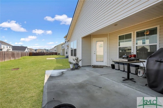 view of patio featuring fence