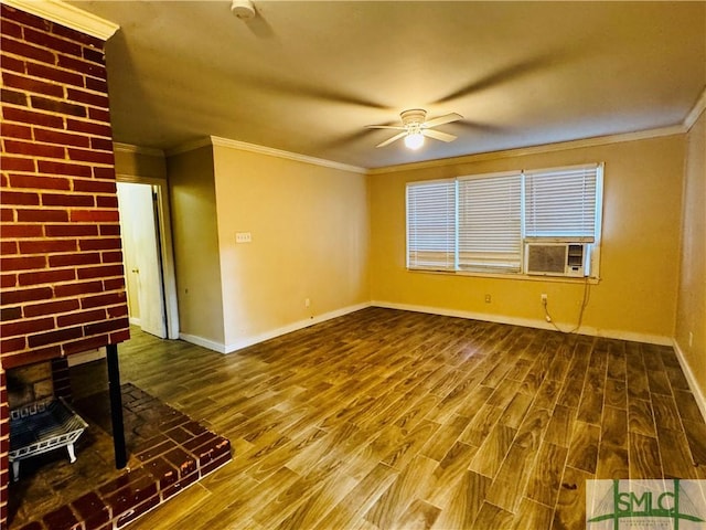 unfurnished living room featuring a ceiling fan, wood finished floors, and ornamental molding