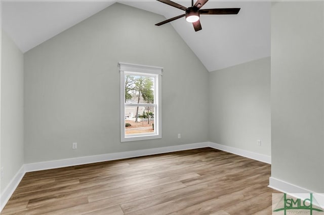 bonus room featuring light wood finished floors, baseboards, lofted ceiling, and ceiling fan