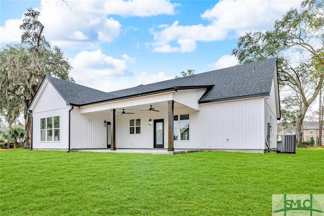 back of house with a yard, a shingled roof, ceiling fan, central air condition unit, and a patio area