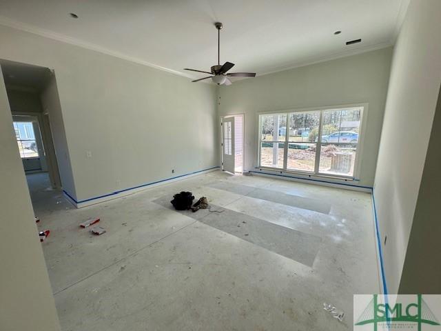 unfurnished living room with visible vents, ceiling fan, and ornamental molding