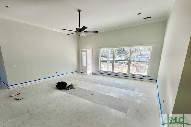 spare room featuring a baseboard heating unit, crown molding, a ceiling fan, and visible vents