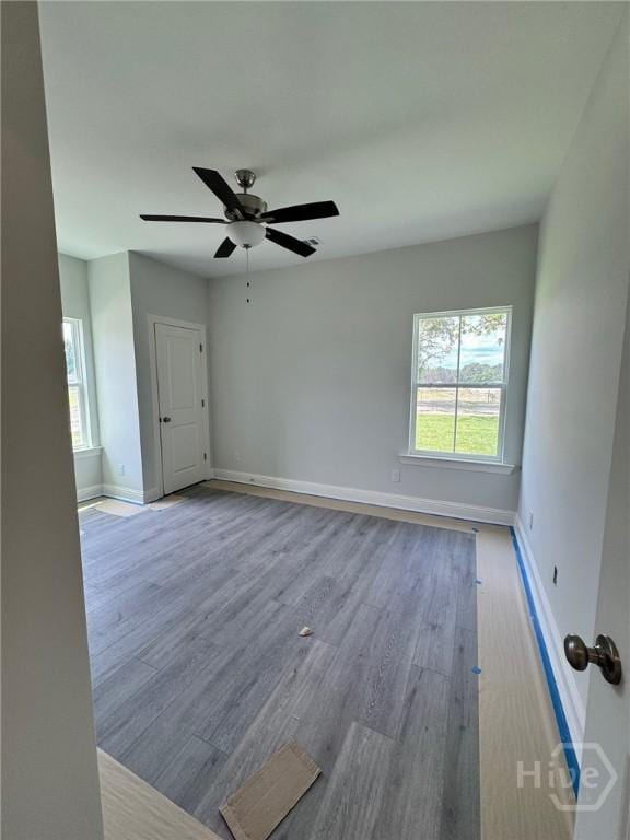 109 Ennis Rd, Pembroke, GA 31321 - empty room featuring wood finished floors and ceiling fan