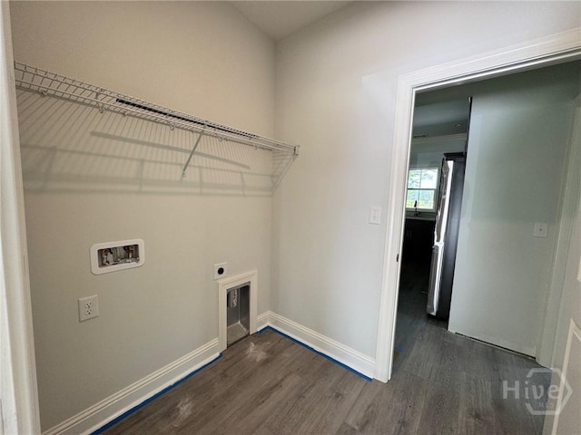 109 Ennis Rd, Pembroke, GA 31321 - washroom with hookup for a washing machine, dark wood finished floors, and electric dryer hookup