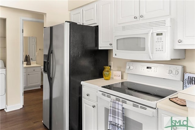 kitchen featuring washer / clothes dryer, white cabinetry, white appliances, light countertops, and dark wood-style flooring