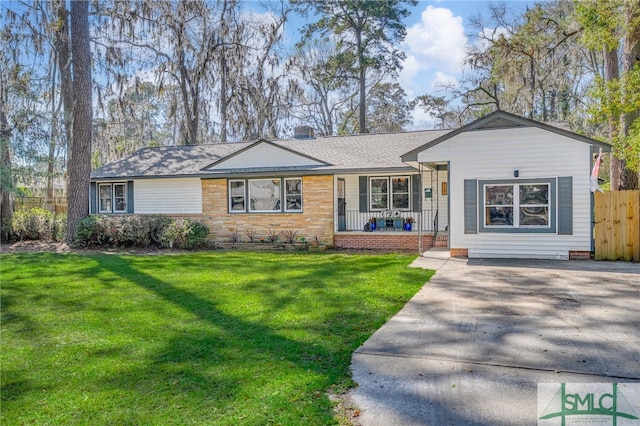 single story home with driveway, a front lawn, a porch, fence, and a chimney