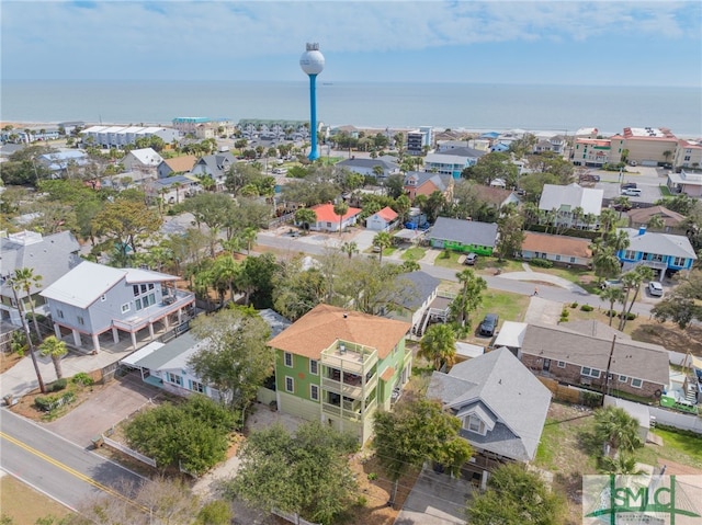 birds eye view of property featuring a residential view and a water view