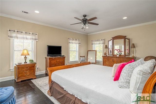 bedroom featuring visible vents, ornamental molding, dark wood finished floors, recessed lighting, and baseboards