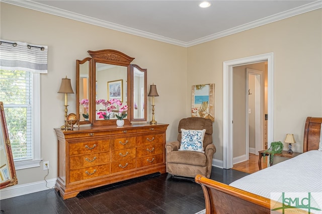 bedroom featuring crown molding, dark wood-style floors, and baseboards