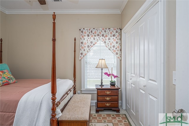 bedroom featuring crown molding and visible vents