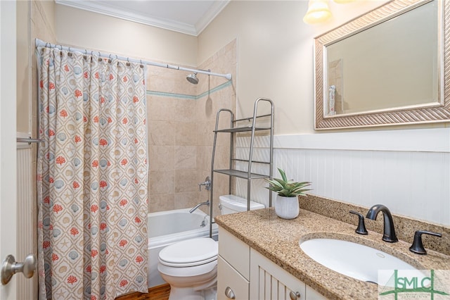 bathroom with vanity, shower / tub combo, wainscoting, crown molding, and toilet