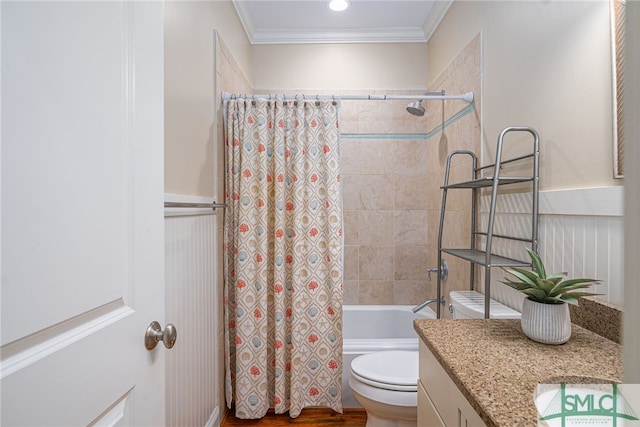 bathroom featuring toilet, shower / bath combo with shower curtain, ornamental molding, wood finished floors, and vanity