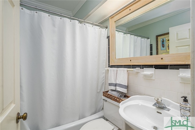 full bathroom featuring a sink, decorative backsplash, tile walls, and crown molding