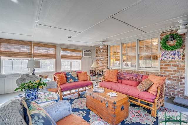 sunroom / solarium featuring a wall mounted AC