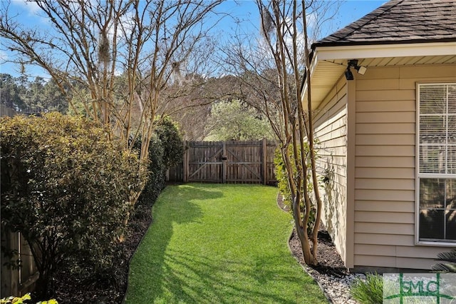 view of yard with fence