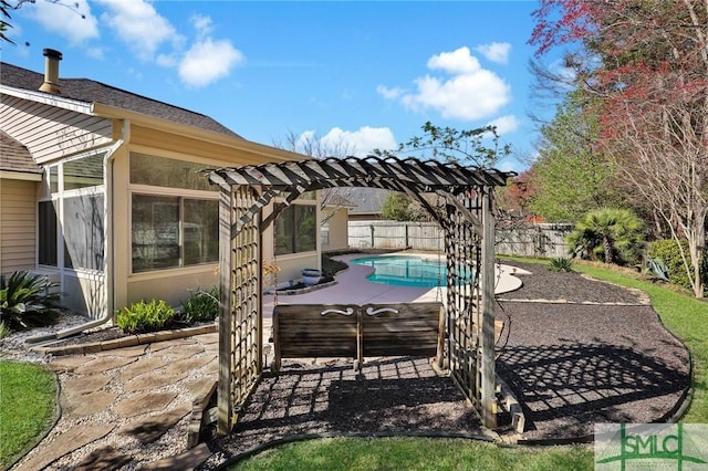 view of patio featuring a fenced in pool, a pergola, and a fenced backyard