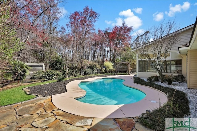 outdoor pool with a sunroom