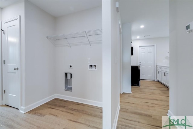 laundry area featuring baseboards, recessed lighting, light wood-style flooring, hookup for a washing machine, and electric dryer hookup