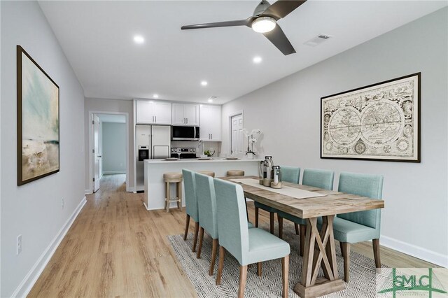 1323 E 69th St, Savannah, GA 31404 - dining room with light wood finished floors, a ceiling fan, recessed lighting, and baseboards
