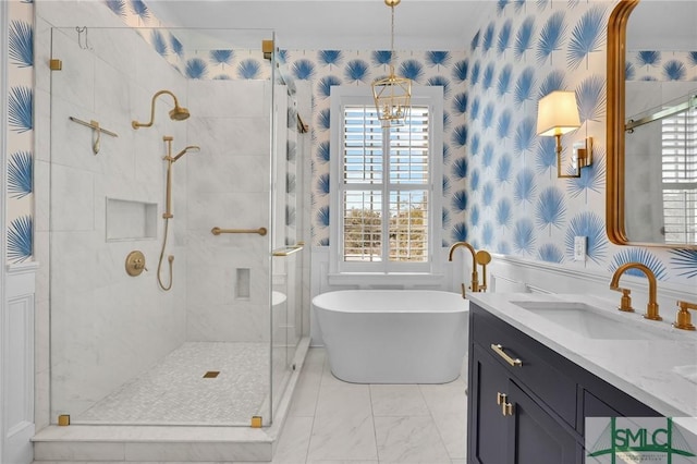 bathroom featuring a notable chandelier, a stall shower, wallpapered walls, a soaking tub, and vanity