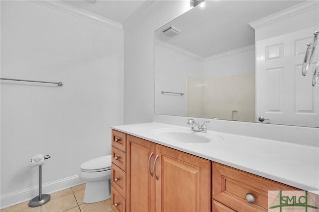 bathroom with tile patterned floors, toilet, vanity, and crown molding