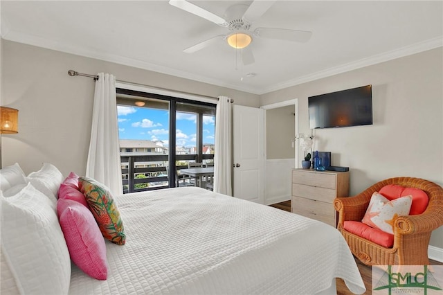 bedroom with crown molding, wood finished floors, and a ceiling fan