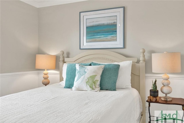 bedroom with wainscoting