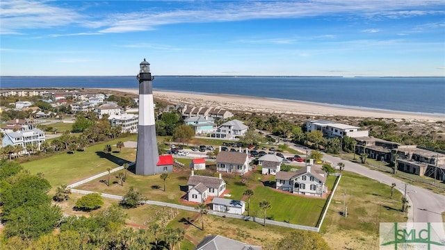 bird's eye view with a view of the beach and a water view