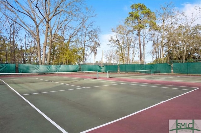 view of sport court featuring community basketball court and fence