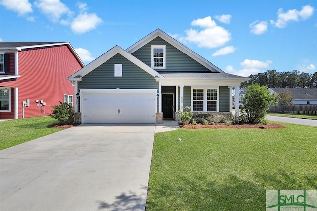 view of front of house featuring an attached garage, concrete driveway, and a front yard