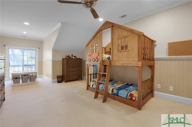 bedroom featuring visible vents, crown molding, carpet floors, wainscoting, and recessed lighting