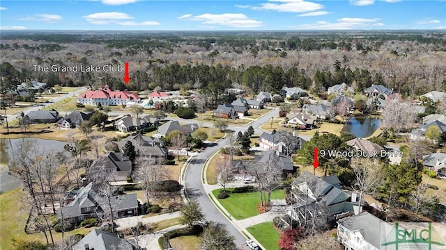 aerial view featuring a residential view and a water view